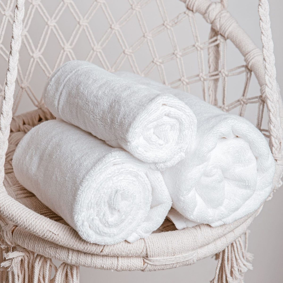 Rolled white pool towels